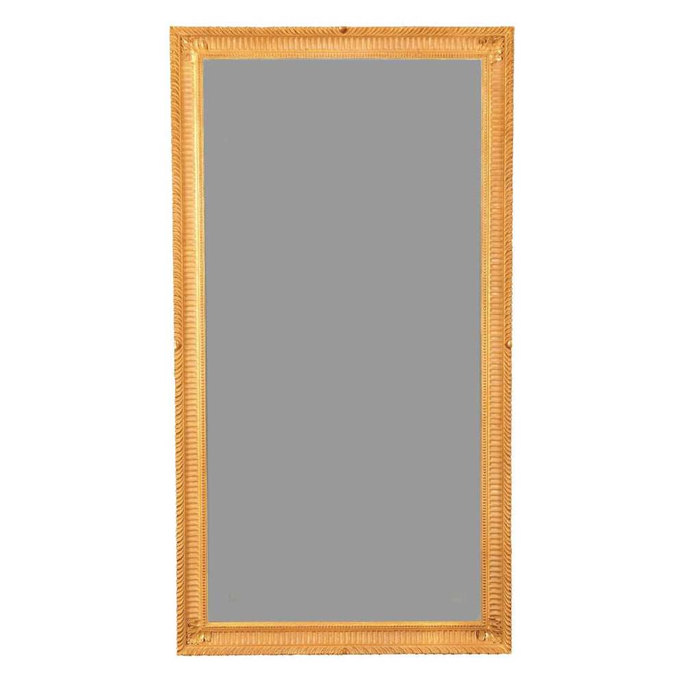 Elegant George III giltwood pier mirror with fluted frame.