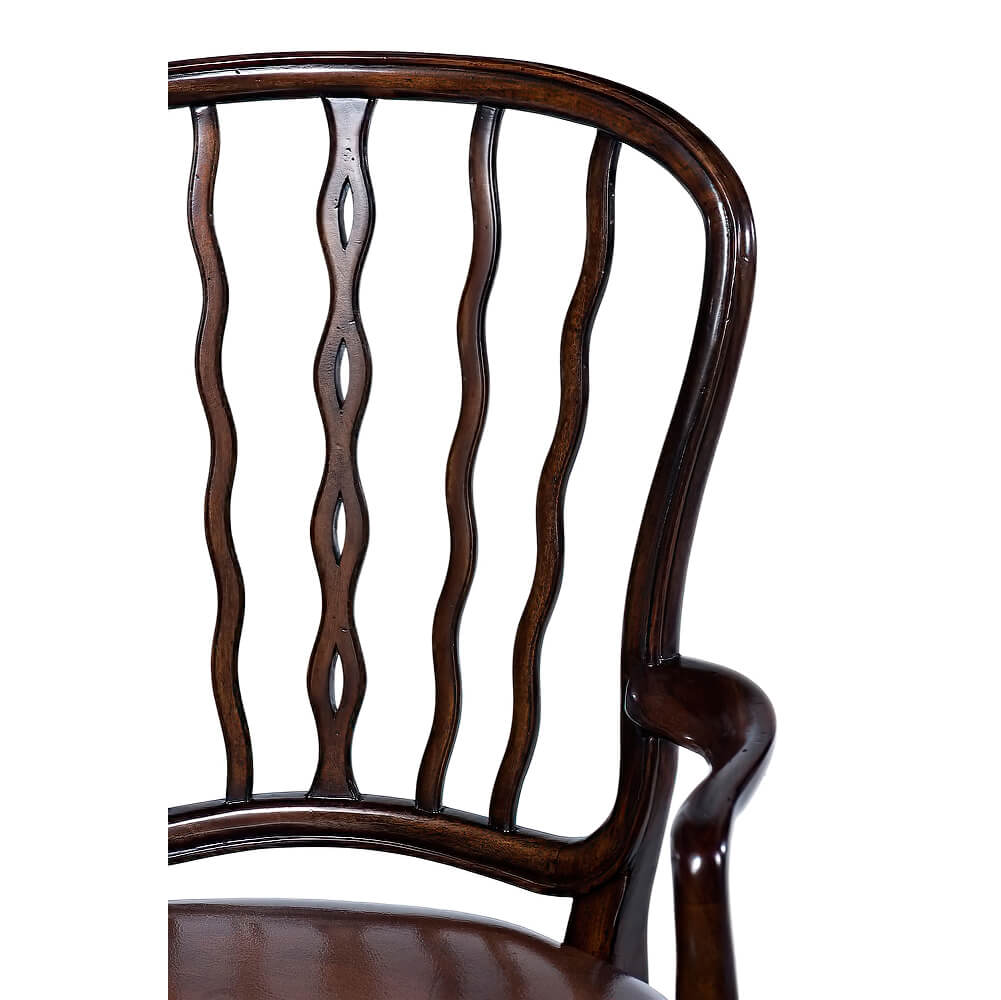 Backrest detailing of mahogany dining armchair.