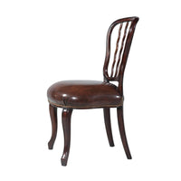 Mahogany dining chair, side profile.