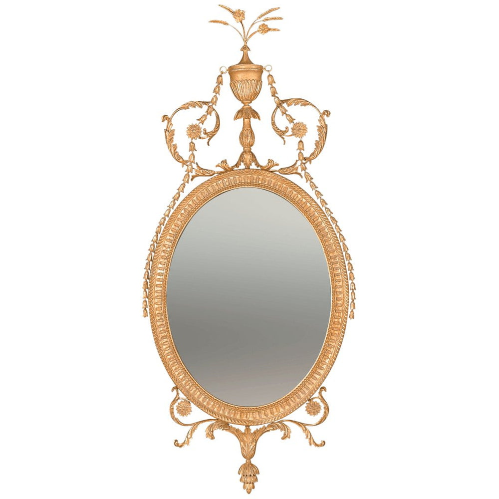 Ornate oval mirror with intricate gold frame design.