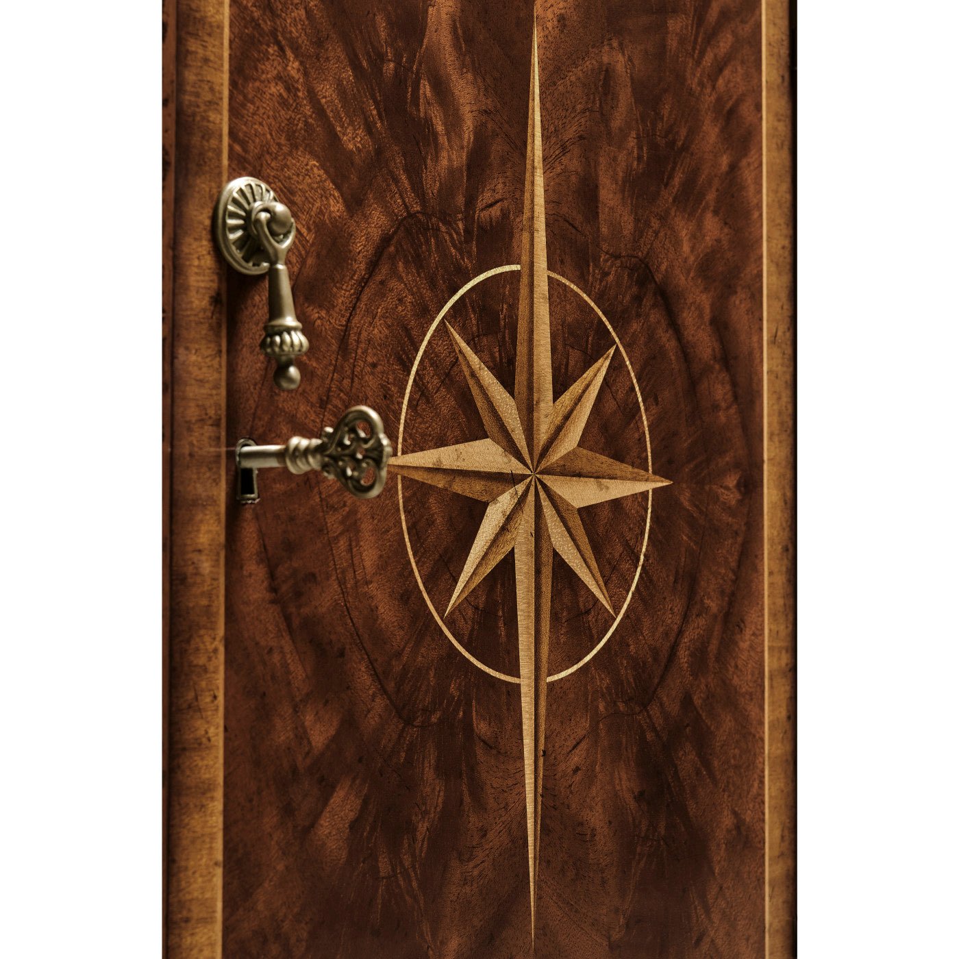 Compass star inlay design on sideboard door.