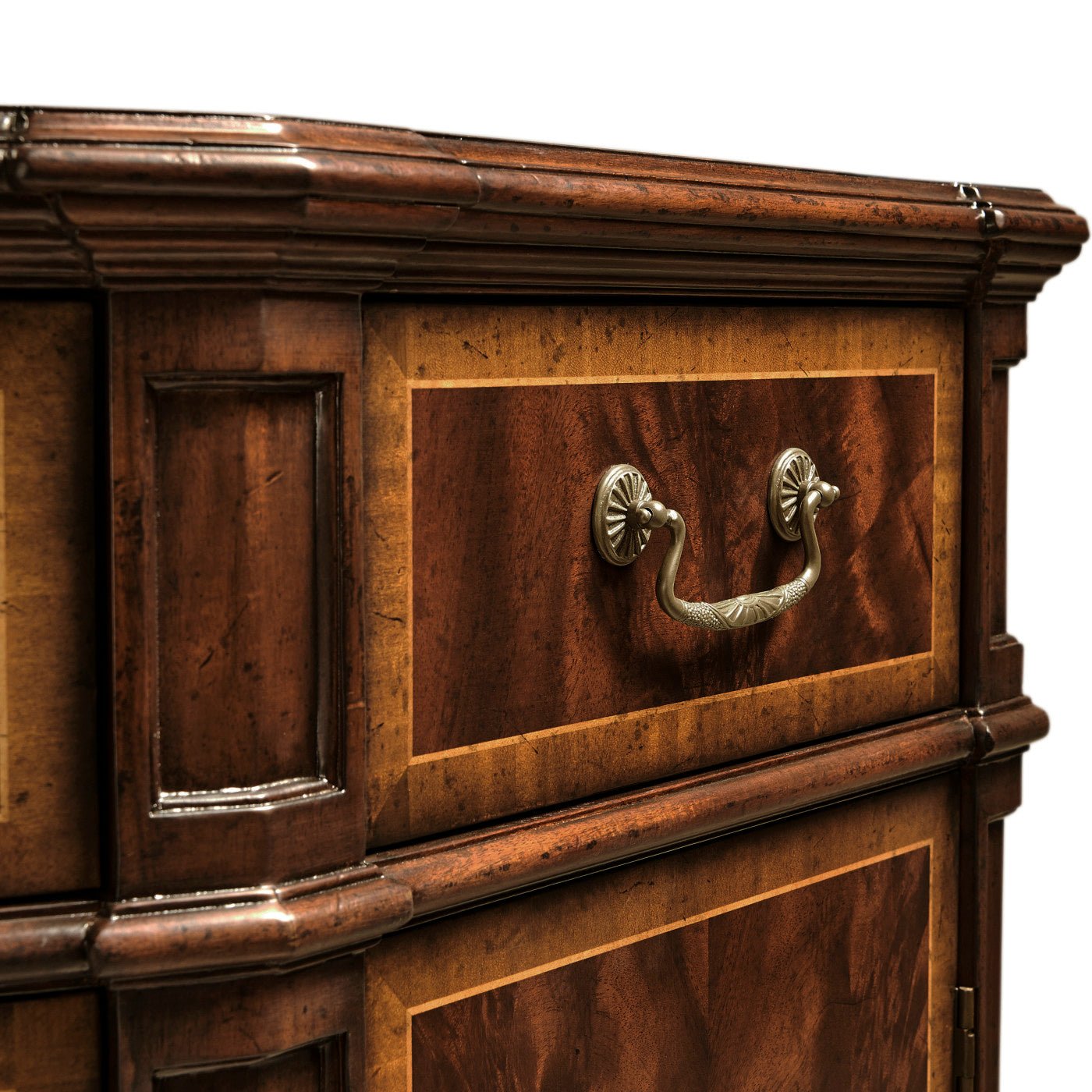 Close-up of sideboard handle and wood detail.