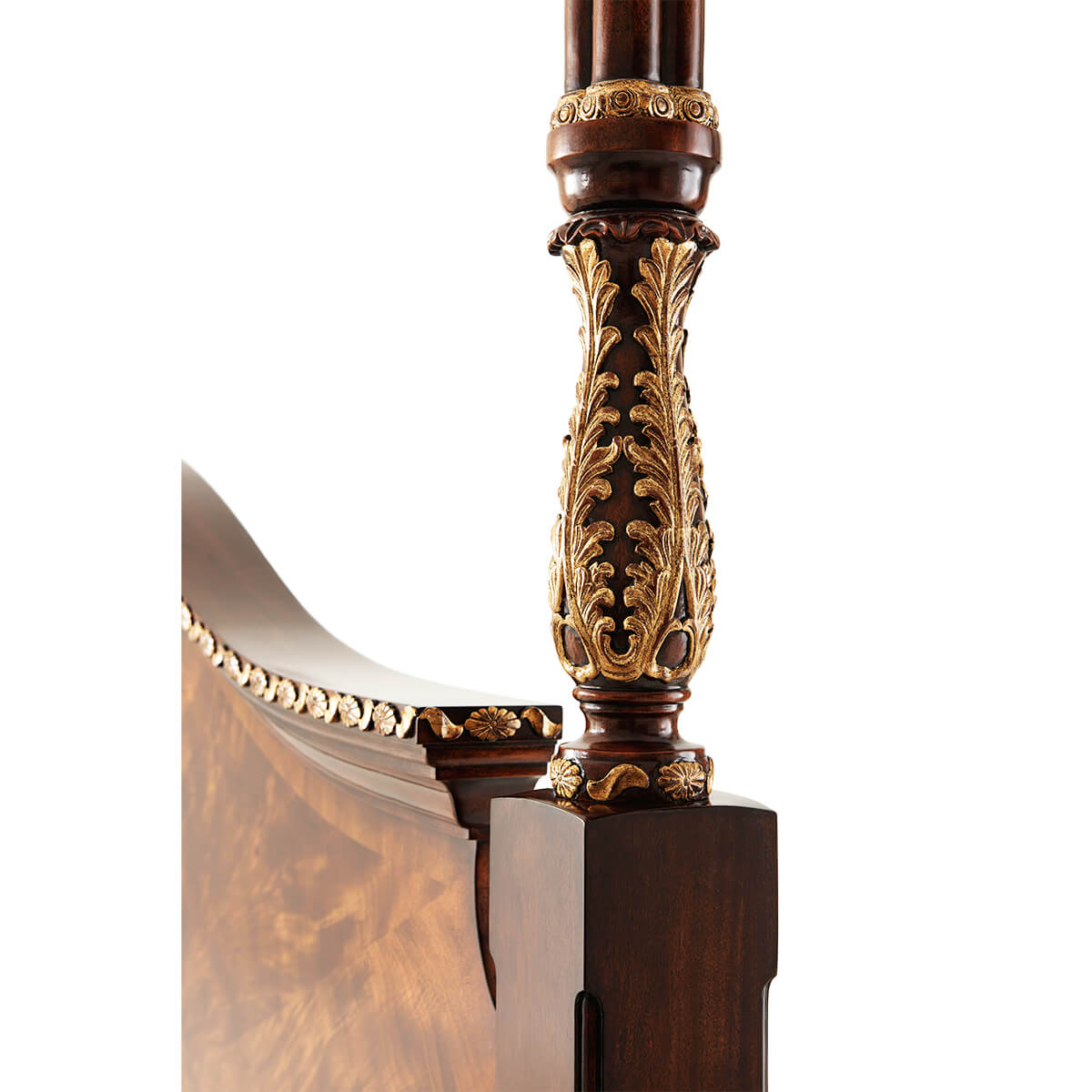 Decorative post detail on mahogany king bed frame.