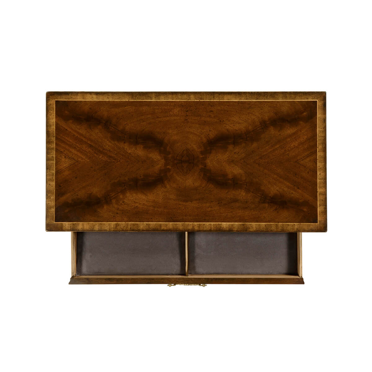 Top view of open drawer compartment in mahogany chest.