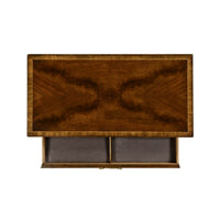 Top view of open drawer compartment in mahogany chest.