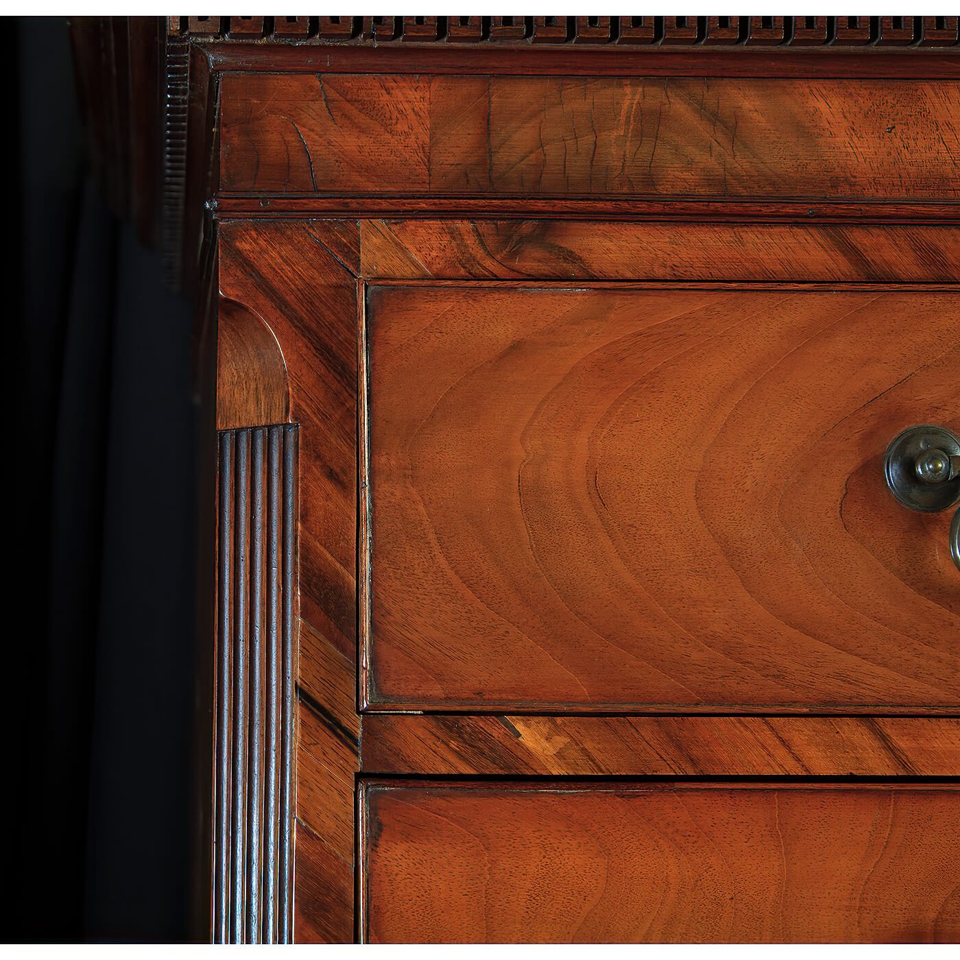 Close-up of intricate wood grain on chest.