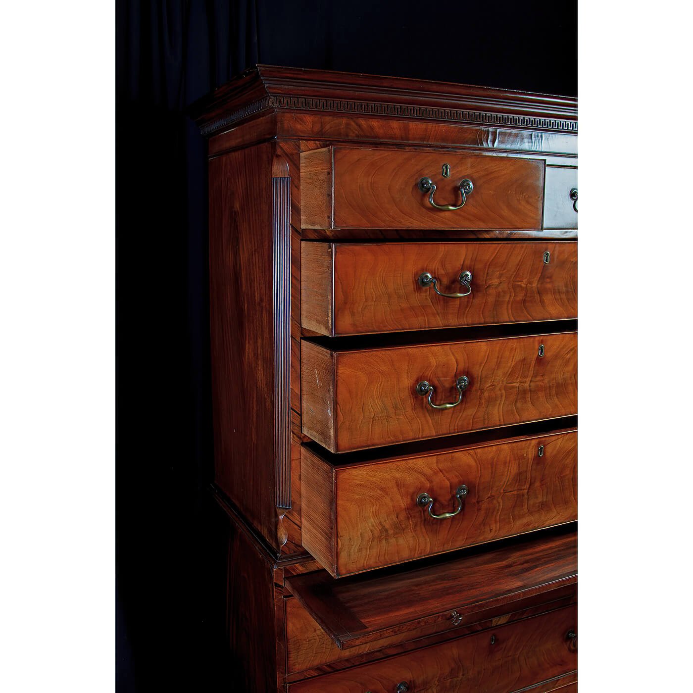 Angled view with multiple drawers slightly open.