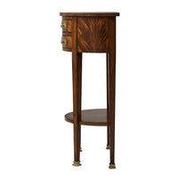 Side view of mahogany demi lune console.