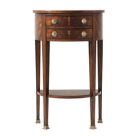 Front view of mahogany demi lune console with drawers.