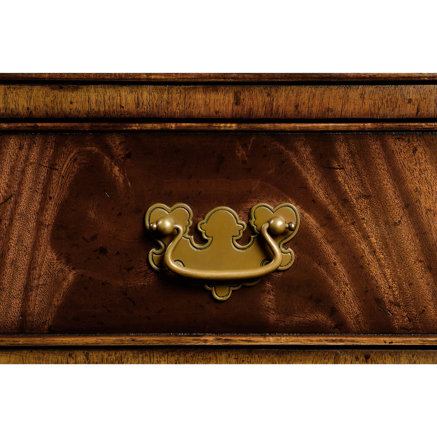 Drawer handle detail on George III mahogany secretary bookcase.
