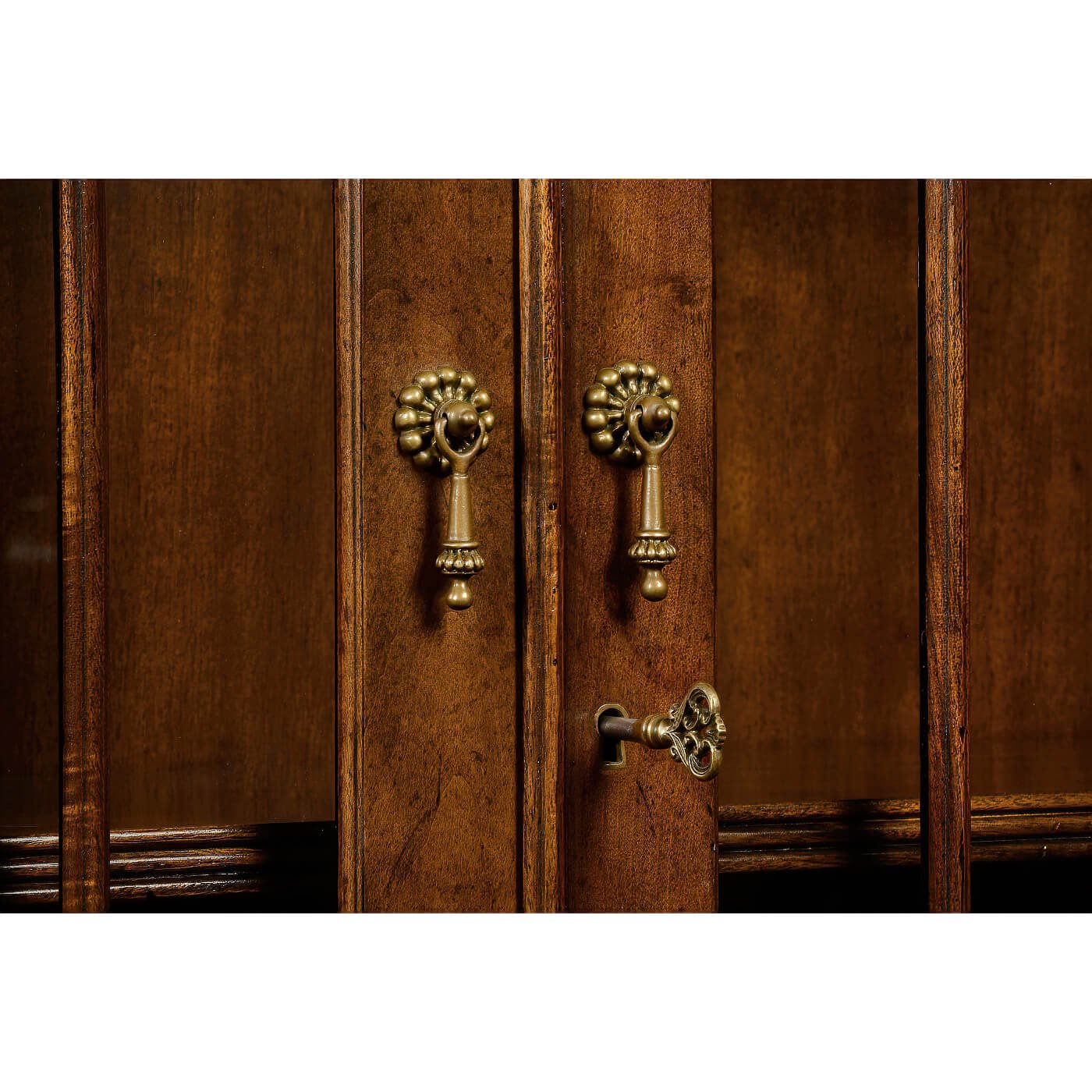 Close-up of handles on George III mahogany secretary bookcase.