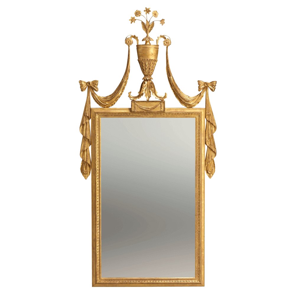 Ornate George III mirror with gilded decorative details.