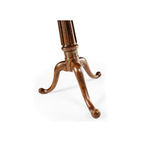 Elegant curved legs of center table in wood finish.