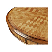 Close-up of parquetry design on center table surface.