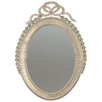 Ornate George III silver gilt oval mirror, detailed design.