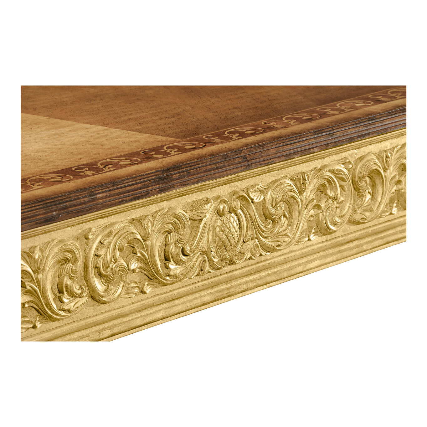 Decorative edge details of the giltwood coffee table.