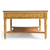 Side perspective of coffee table showcasing detailed carvings.