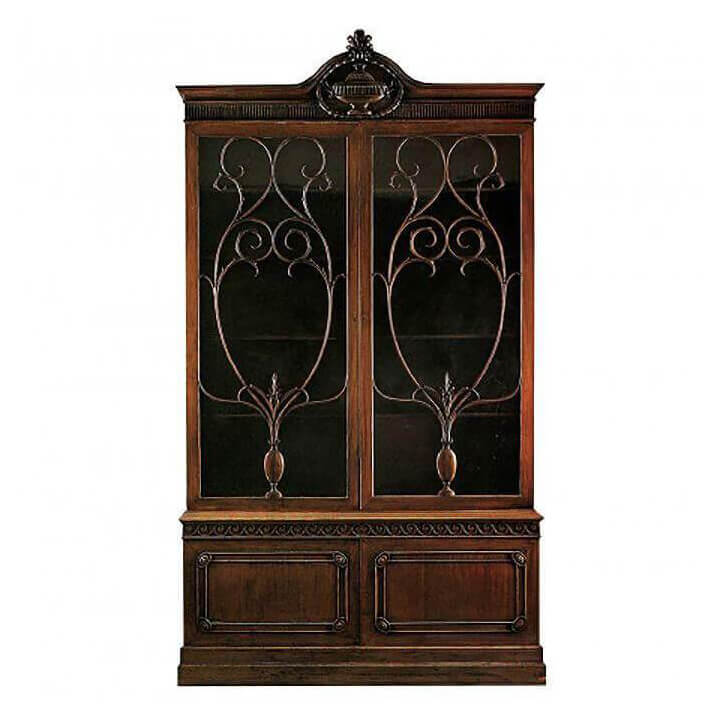 Elegant George III style mahogany bookcase with intricate design.