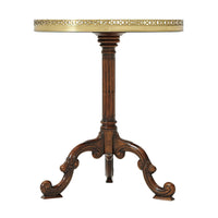 Side view of oval table with ornate pedestal base.