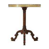 Front view artistry, three-legged table base detail.