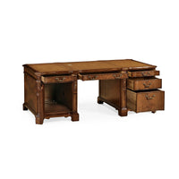 Open drawers on walnut pedestal desk.