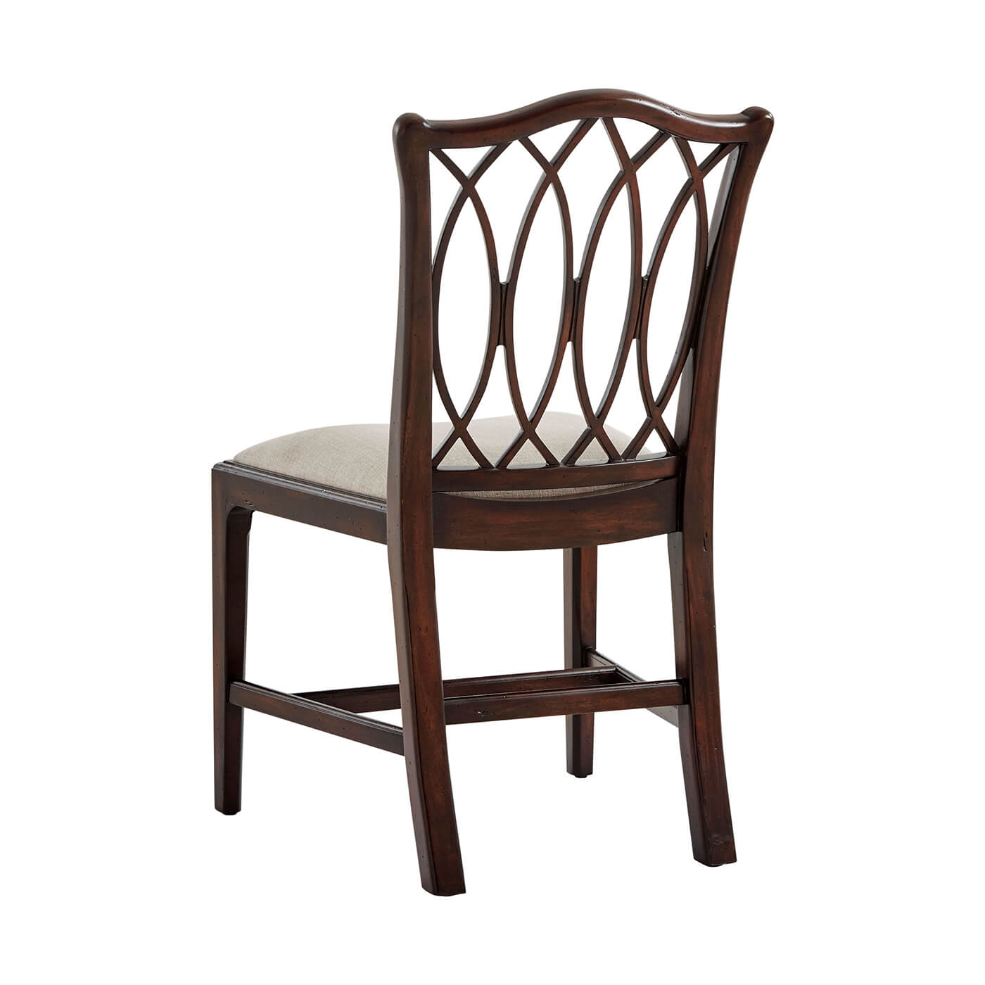 Wooden dining chair with trellis back design, rear view.