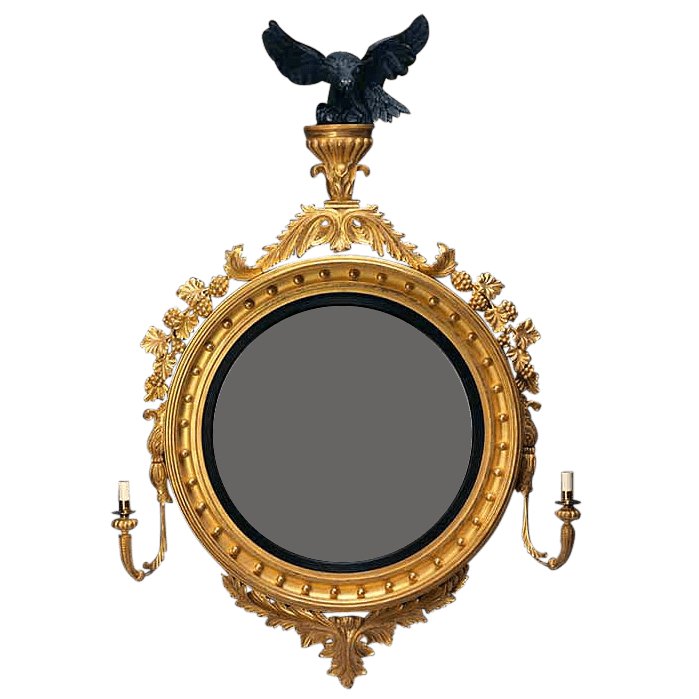 Ornate George IV convex mirror with eagle decoration.