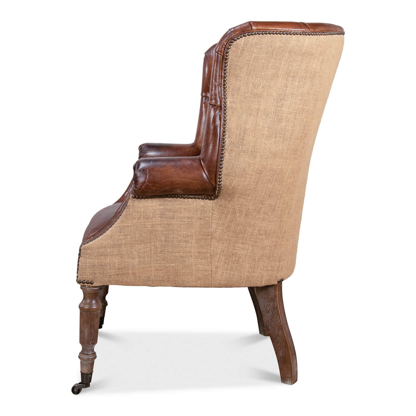 Jute and leather barrel chair, side view.
