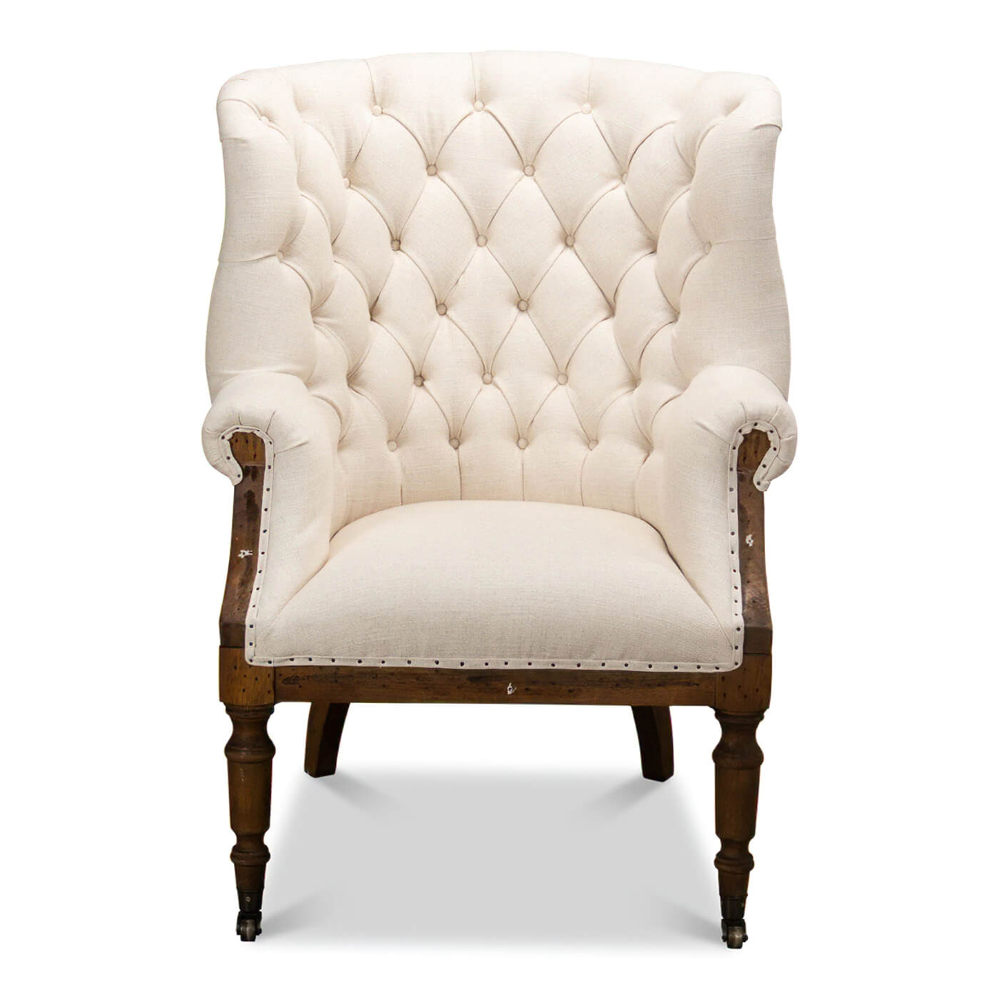 Front view of tufted Georgian barrel back chair.