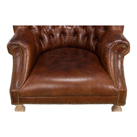Front seat view of leather wingchair.