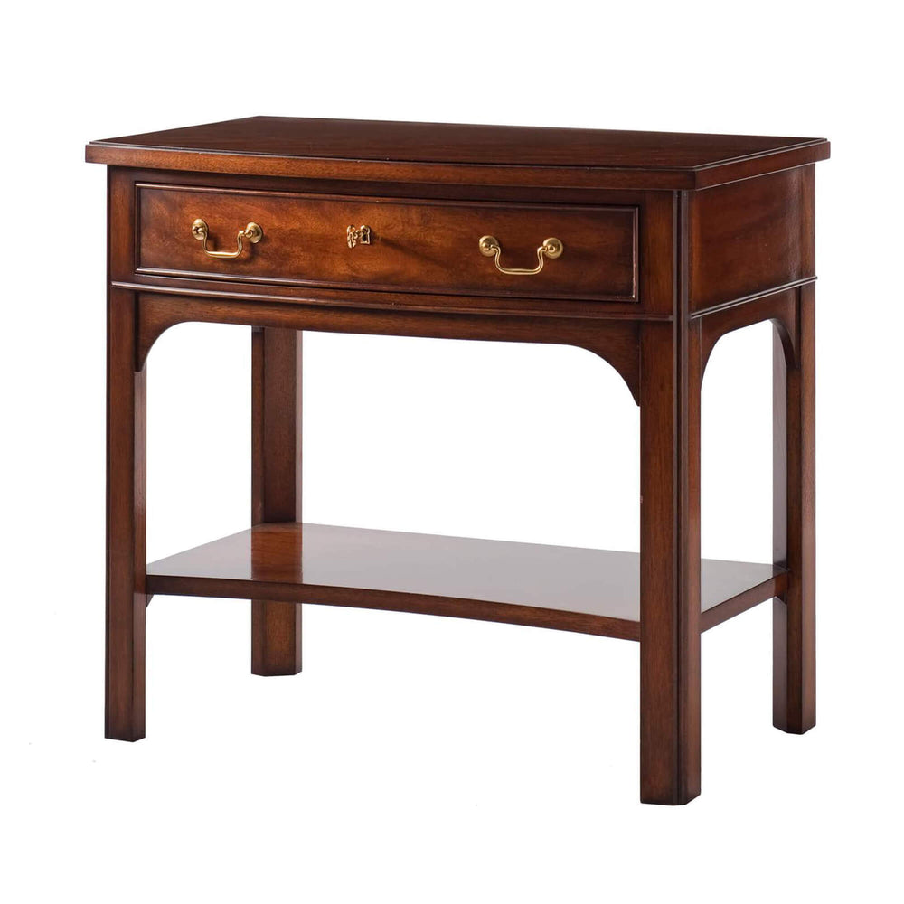 Wooden bedside table with brass handles, front view.