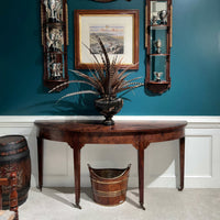 Decorated Georgian console table, displayed in elegant room.