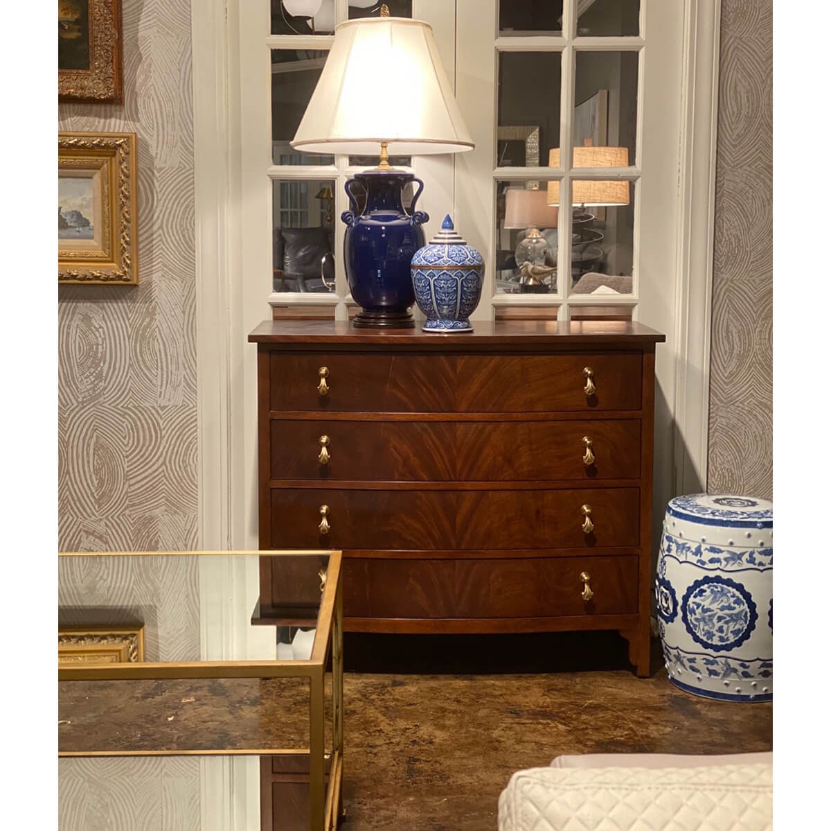 Georgian mahogany chest styled in a classic interior setting.