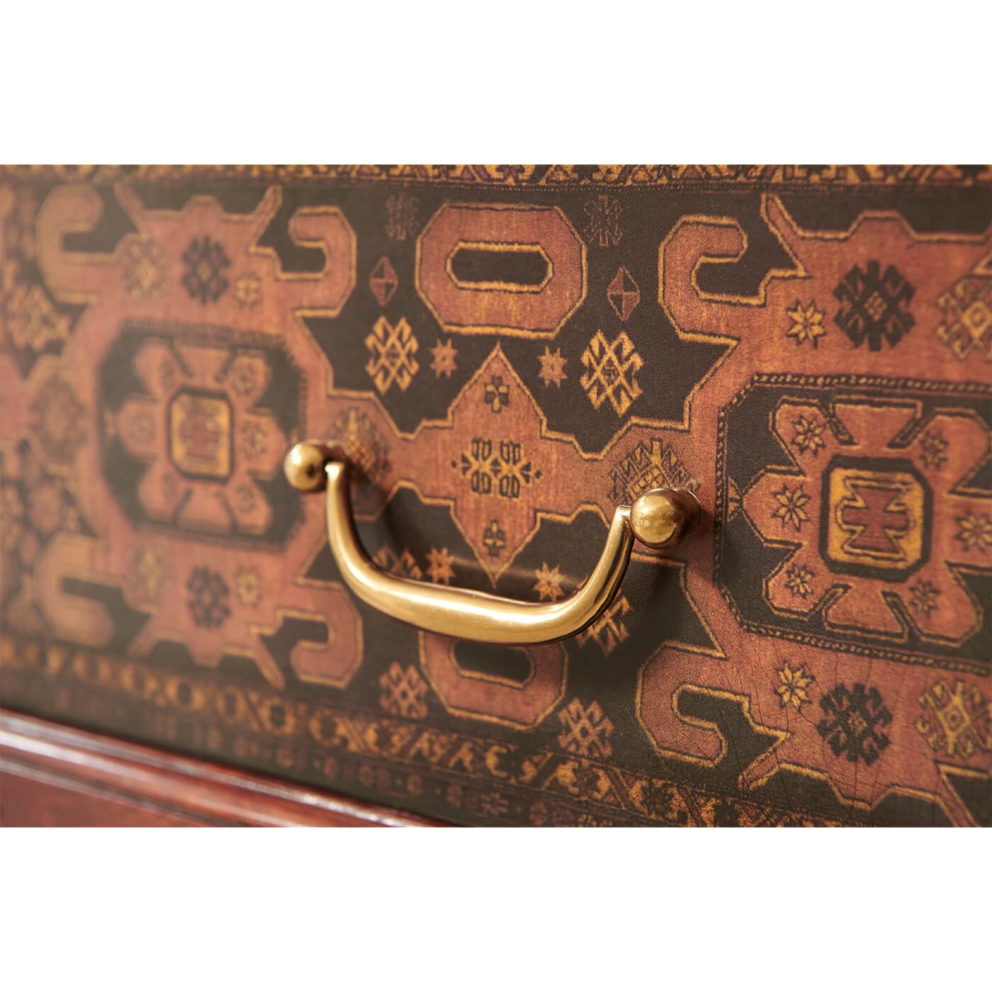 Close-up of Georgian end table brass handle detail.