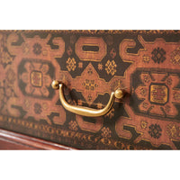 Close-up of Georgian end table brass handle detail.