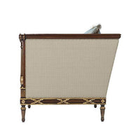 Side view of Georgian mahogany armchair detailing.