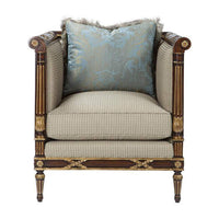 Front view of Georgian mahogany armchair, decorative pillow.