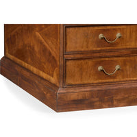 Base of walnut partners desk with drawer details visible.