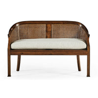 Wooden bench with cane detailing, straight front view.