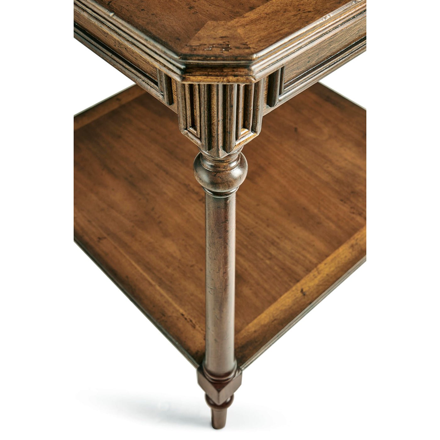 Side angle of Georgian table's intricate leg detail.