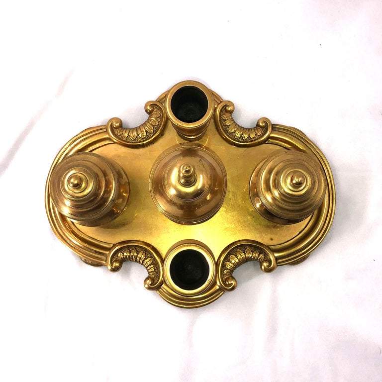 Overhead shot of ornate gilt bronze desk set.
