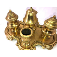Top view of gilt bronze desk set with intricate design.