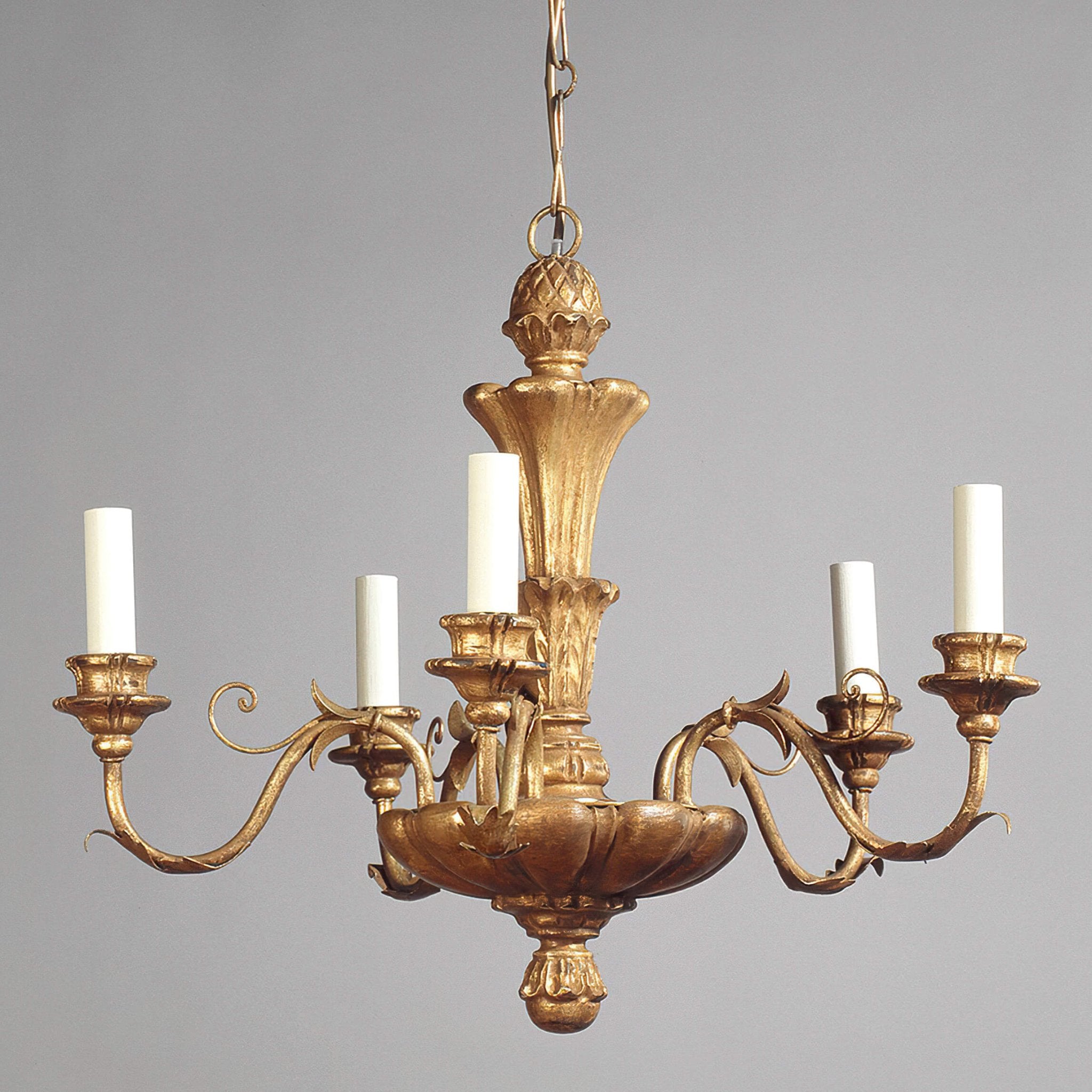 Elegant five-light chandelier in ornate Rococo style.