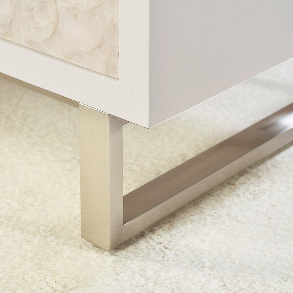 Leg detail of glam minimalist chest of drawers.
