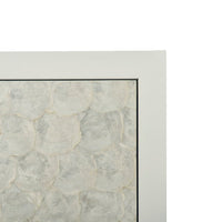 Close-up texture on glam minimalist chest drawer front.