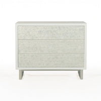 Glam minimalist chest of drawers, straight front view.