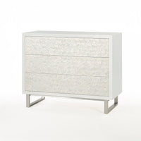 Glam minimalist chest of drawers, pristine front angle.