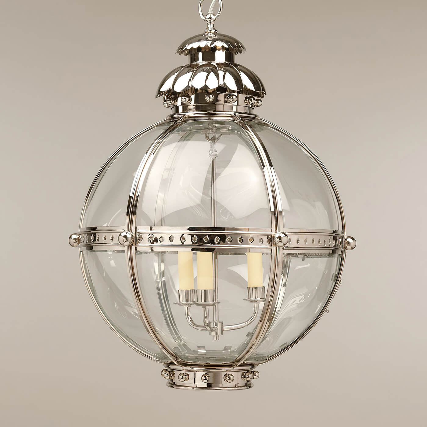 Large nickel globe lantern, angled view.