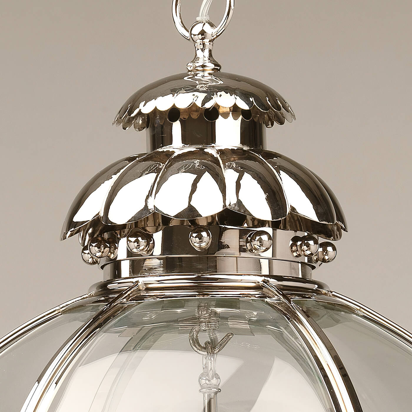 Top detail of nickel globe lantern.