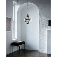 Globe lantern in modern room, hanging display.